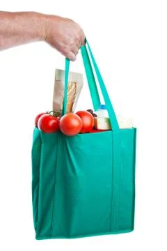 Groceries in hand Stock Photos