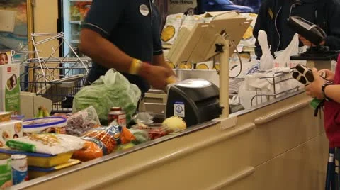 Grocery Checker Scans Items Stock Footage 21374604