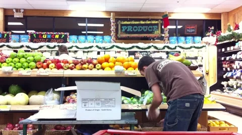 Grocery Store Clerk Restocking Stock Footage 977531