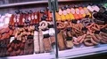 Grocery store counter with meats products HD Footage