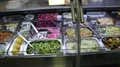 Grocery store counter with salads and natural products HD Footage