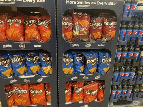 Grocery store Doritos chips display variety Stock Photos