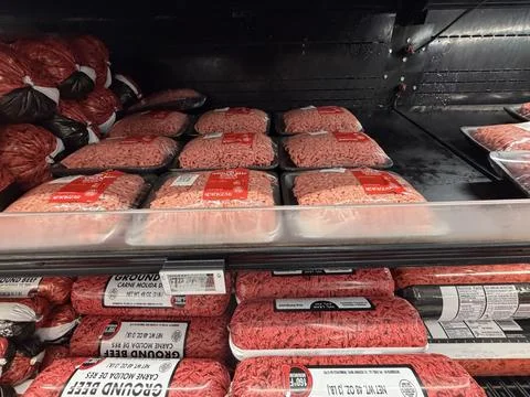 Grocery Store Ground Beef Display With Packaged Fresh Meat front facing Stock Photos