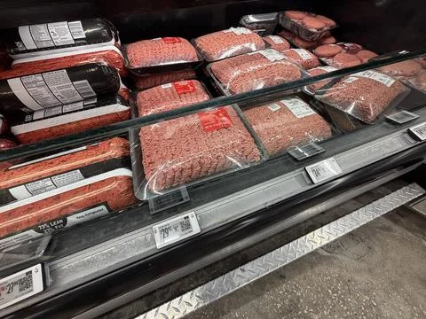Grocery Store Ground Beef Display With Packaged Fresh Meat prices Stock Photos