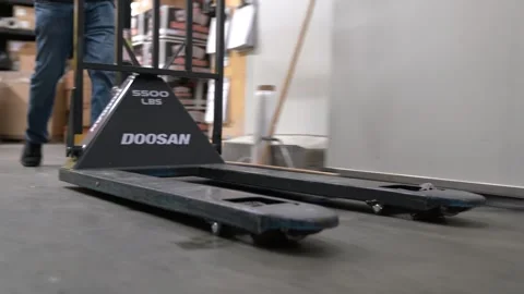 Grocery Store Moving Pallet with Jack Stock Footage 268509812