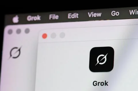 Grok AI assistant on computer Stock Photos