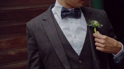 Groom accessory on the street Stock Footage 61774271