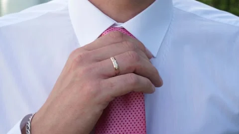 The groom adjusts the suit Stock Footage 163566754