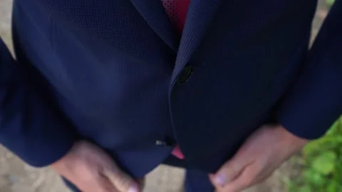The groom adjusts the suit Stock Footage 163566767