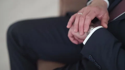 The groom adjusts the suit Stock Footage 163566825