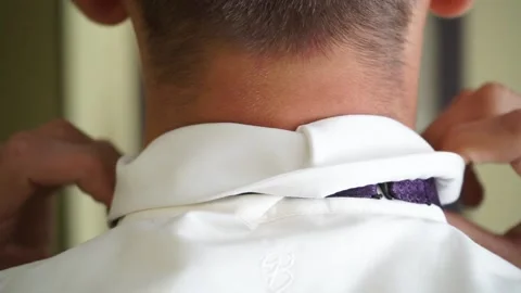 The groom adjusts the suit Stock Footage 163567173