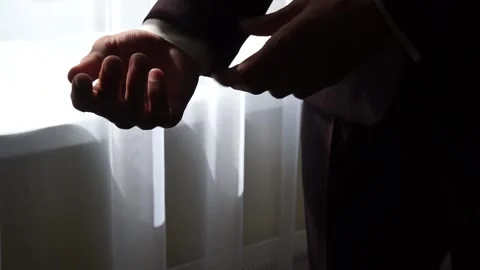 The groom adjusts the suit Stock Footage 163567186