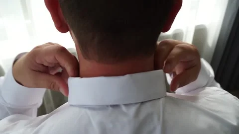The groom adjusts the suit Stock Footage 163567674