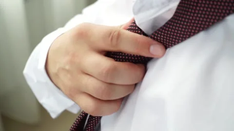 The groom adjusts the suit Stock Footage 163567687