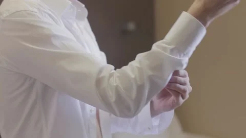 The groom adjusts the suit Stock Footage 163567829