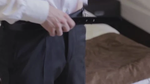 The groom adjusts the suit Stock Footage 163567837