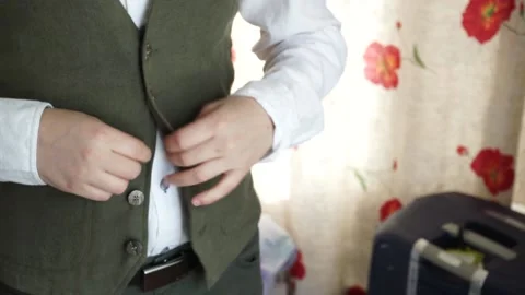 The groom adjusts the suit Stock Footage 163567979