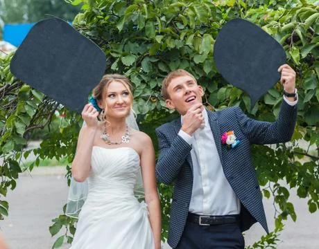 The groom and the bride with interactive tablets Stock Photos