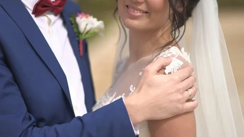 Groom and bride looking in each other's eyes and smiling Stock Footage 94212944