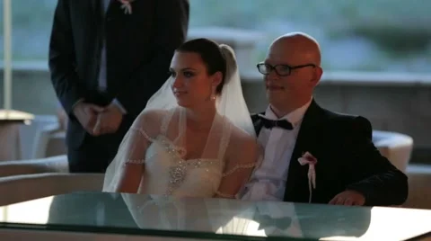 Groom And Bride Sitting At Table Stock Footage 51733653