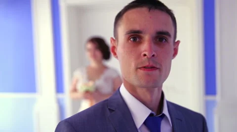 The groom on the background of the bride. Clouse up Stock Footage 67980887