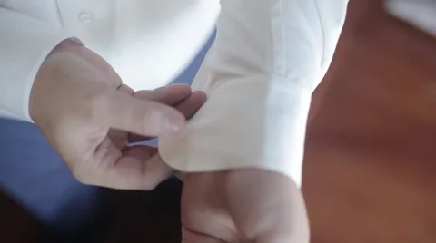 The Groom Buttons Cufflinks Stock Footage 50635456
