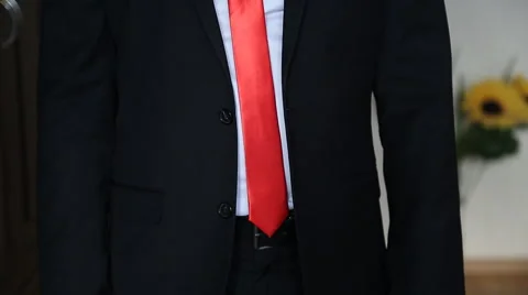 Groom buttons jacket Stock Footage 50626956