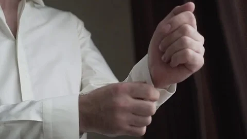 Groom Buttons Stud Cuff White Shirt. Groom Buttons Left Sleeve White Shirt. Stock Footage 77237173