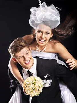 Groom embracing bride . Stock-Fotos