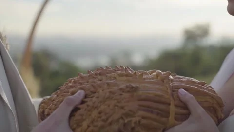 Groom feeds bride with wedding bread. Slow motion Stock Footage 152754237