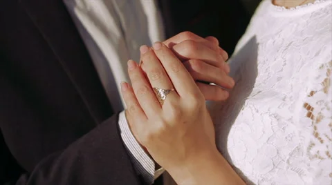 Groom Gently Touching the Neck of Bride at Sunset Stock Footage 62353914