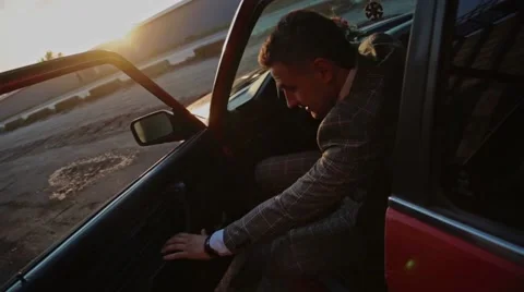 Groom gets out of the car Stock Footage 61774332