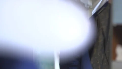 Groom gettin dark-blue  jacket on preparing for the wedding in hotel suite Stock Footage 94212567