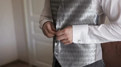 Groom getting dressed Stock Footage 61910058