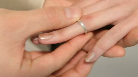Groom giving ring to his bride Stock Footage 158964031