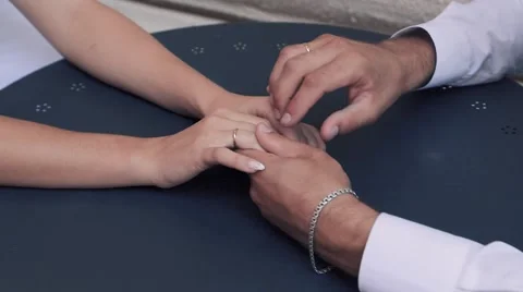 The groom hands bride stroking Stock Footage 58852158