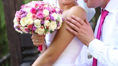 The groom holds the bride Stock Footage 45833729