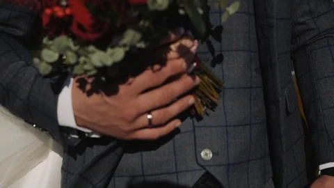 The groom holds the bride's hand with the ring on your finger Stock-Footage 101685664