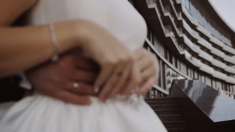 Groom hugging the bride from behind Video stock 101685396
