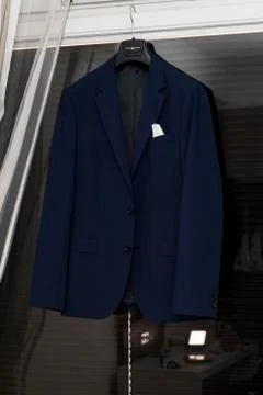 The groom jacket hangs on the ceiling Stock Photos