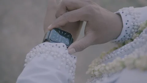 Groom look watch 库存影片 219377875