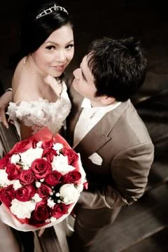 Groom looking at bride Stock Photos