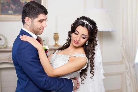 Groom looking at bride Stock Photos