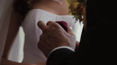 The Groom Opens a Box With a Ring. Wedding day. Stock-Footage 52490454