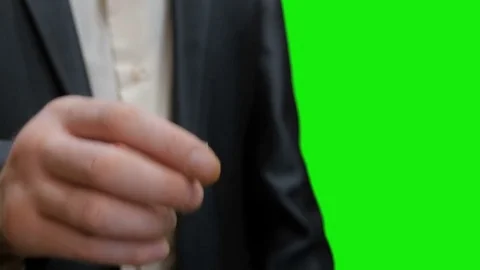 The groom opens the box with a wedding ring. Green screen. Video stock 73128282