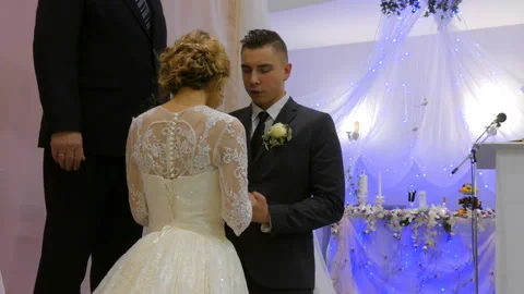 The groom prays on knees Stock Footage 86596348