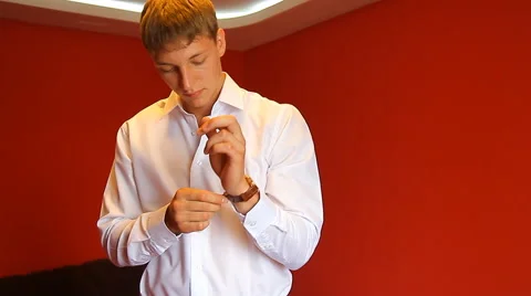 Groom prepares for wedding Stock Footage 58203305