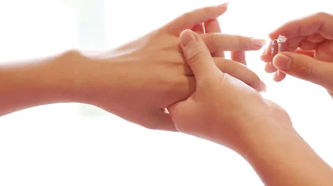 Groom putting wedding ring to bride 스톡 동영상 52516033