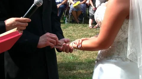 Groom putting on wedding ring.m2ts Stock Footage 8524171