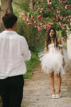 Groom Seen From Behind Facing The Bride Stock Photos
